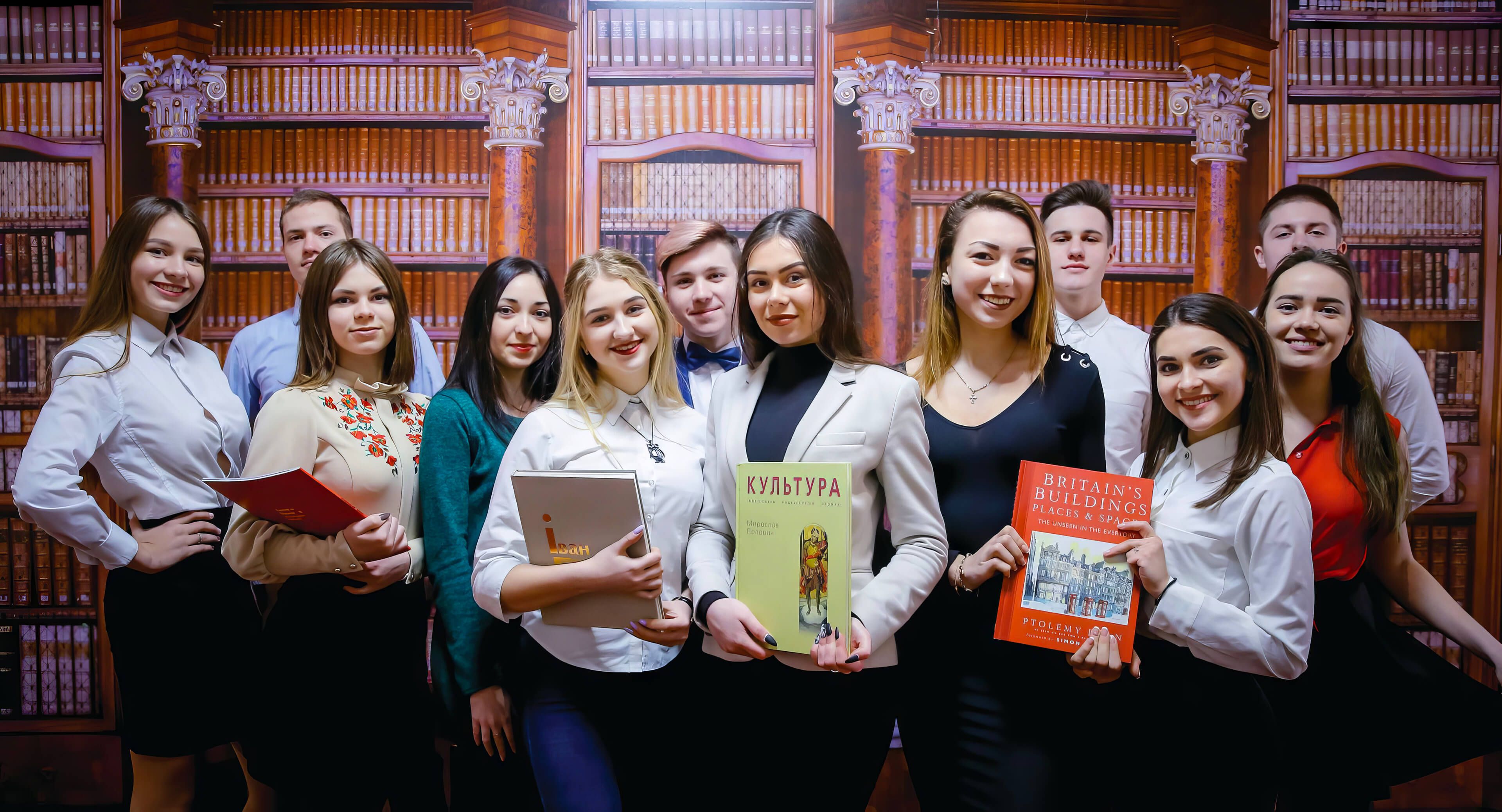 students of the faculty of sociocultural activities with books